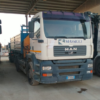 Autocarro MAN 26.410 F con Gru